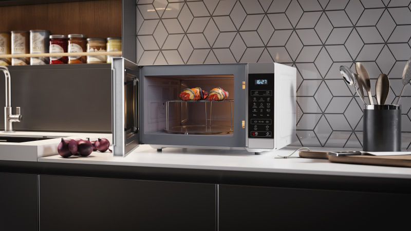 מיקרוגל Sharp R-709W לבן בעיצוב מודרני על השיש במטבח